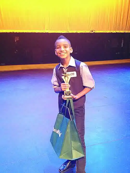 Zeke Pujols as a young singing competition winner